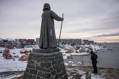 The statue of missionary Hans Egede stands overlooking the city of Nuuk, Greenland, on January 22, 2026. (Photo by Jonathan NACKSTRAND / AFP)<!-- NICAID(16210438) -->