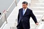 Chinese President Xi Jinping disembarks from a plane as he arrives at San Francisco International airport to attend the Asia-Pacific Economic Cooperation (APEC) leaders' week in San Francisco, California, on November 14, 2023. Xi arrived in San Francisco on November 14, 2023, a day ahead of his highly anticipated meeting with American counterpart Joe Biden. Xi last traveled to the United States six years ago, and is due for lengthy talks with Biden in their first in-person meeting in a year. The two presidents are meeting on the sidelines of the Asia-Pacific Economic Cooperation (APEC) summit as both countries seek to stabilize ties. (Photo by Frederic J. BROWN / AFP)<!-- NICAID(15597936) -->