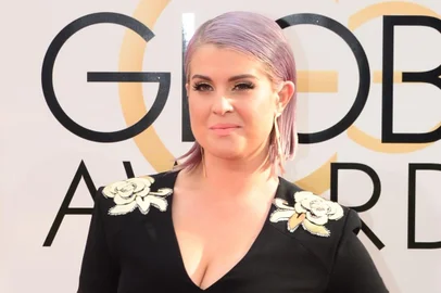 Kelly Osbourne arrives on the red carpet for the Golden Globe awards on January 12, 2014 in Beverly Hills, California.    AFP PHOTO / Frederic J. BROWN<!-- NICAID(10129910) -->