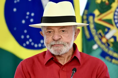 Brazil's President Luiz Inacio Lula da Silva gestures during the announcement of a new credit facility for the purchase of trucks and buses at the Planalto Palace in Brasília on April 30, 2026. President Lula da Silva suffered two consecutive defeats in Congress: the rejection of Jorge Messiass nomination to fill a vacancy on the Supreme Court and the overturning of his veto of the sentencing reform law, which reduces the sentence of former President Jair Bolsonaro, convicted of attempting a coup détat (Photo by Evaristo Sa / AFP)<!-- NICAID(16278936) -->