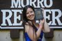 MORRO REUTER, RS, BRASIL - 21/02/2024 - A jovem Milena Farias, que viralizou nas redes sociais ao pedir ajuda para juntar dinheiro pra viajar à Suíça, onde receberá um prêmio de poesia pelo seu ebook. FOTO: RONALDO BERNARDI, AGÊNCIA RBS<!-- NICAID(15685266) -->