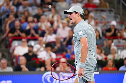 MINAS PANAGIOTAKIS / GETTY IMAGES NORTH AMERICA MONTREAL, CANADA - AUGUST 07: Joao Fonseca of Brazil reacts after winning the first set against Casper Ruud of Norway during their singles third round match on day six of the ATP 1000 National Bank Open presented by Rogers at Stade IGA on August 7, 2026 in Montreal, Quebec, Canada. Minas Panagiotakis/Getty Images/AFP (Photo by Minas Panagiotakis / GETTY IMAGES NORTH AMERICA / Getty Images via AFP)<!-- NICAID(16342789) -->