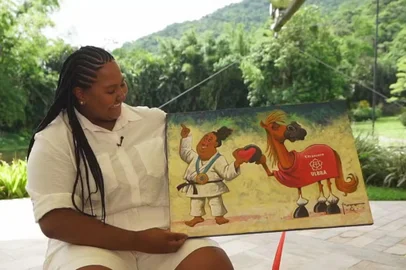 Beatriz Souza e Caramelo no Fantástico<!-- NICAID(15941321) -->