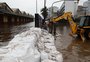 Quais os argumentos do Dmae para substituir oito comportas por muros de concreto no sistema de proteção contra cheias
