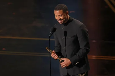 HOLLYWOOD, CALIFORNIA - MARCH 15: Michael B. Jordan accepts the Actor in a Leading Role award for "Sinners" onstage during the 98th Oscars at Dolby Theatre on March 15, 2026 in Hollywood, California.   Kevin Winter/Getty Images/AFP (Photo by KEVIN WINTER / GETTY IMAGES NORTH AMERICA / Getty Images via AFP)<!-- NICAID(16245822) -->