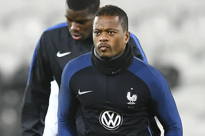 (FILES) This file photo taken on November 14, 2016 shows France's defender Patrice Evra running during a training session at the Bollaert stadium in Lens on November 14, 2016, on the eve of the friendly football match against Ivory Coast. French international defender of Juventus Turin Patrice Evra, 35, will commit for 18 months to Marseille, announced January 23, according to various French media.FRANCK FIFE / AFP<!-- NICAID(12696730) -->
