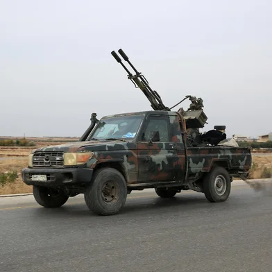 Forças antigovernamentais dirigem-se à cidade de al-Rastan, na província de Homs, no centro-oeste da Síria<!-- NICAID(15930874) -->