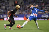 Barcelona's Spanish forward #19 Lamine Yamal (L) vies for the ball with Espanyol's Spanish forward #07 Javier Puado during the Spanish league football match between RCD Espanyol and FC Barcelona at the RCDE Stadium in Cornella de Llobregat, on May 15, 2025. (Photo by MANAURE QUINTERO / AFP)<!-- NICAID(16038165) -->