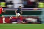 France's forward #10 Kylian Mbappe runs for the ball during the Qatar 2022 World Cup semi-final football match between France and Morocco at the Al-Bayt Stadium in Al Khor, north of Doha on December 14, 2022. (Photo by GABRIEL BOUYS / AFP)<!-- NICAID(15297802) -->