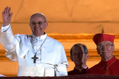 Argentina Jorge Bergoglio, elected Pope Francis I waves from the window of St Peter Basilica balcony after being elected the 266th pope of the Roman Catholic Church on March 13, 2013 at the Vatican<!-- NICAID(9192818) -->