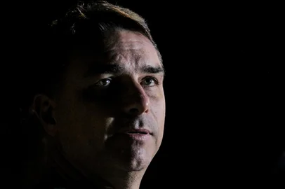 Brazilian Senator Flavio Bolsonaro, son of former President Jair Bolsonaro (2019-2022), speaks to the press during the launch of his pre-candidacy for the presidency in Florianopolis, Santa Catarina state, Brazil, on May 9, 2026. Brazilian senator Flavio Bolsonaro has emerged as President Luiz Inacio Lula da Silva's main rival in October's presidential election, in which the leftist is expected to seek a fourth term in office. (Photo by Vitor SOUZA / AFP)<!-- NICAID(16284991) -->