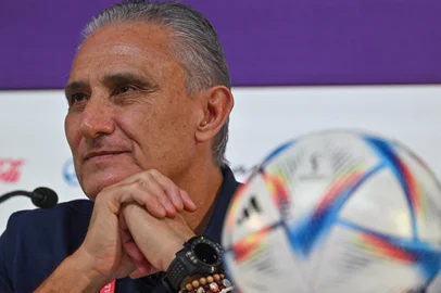 Brazil's coach Tite attends a press conference at the Qatar National Convention Center (QNCC) in Doha on November 27, 2022, on the eve of the Qatar 2022 World Cup football match between Brazil and Switzerland. (Photo by NELSON ALMEIDA / AFP)<!-- NICAID(15277769) -->