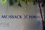 View of a sign outside the building where Panama-based Mossack Fonseca law firm offices are placed in Panama City on April 3, 2016. A massive leak -coming from Mossack Fonseca- of 11.5 million tax documents on Sunday exposed the secret offshore dealings of aides to Russian president Vladimir Putin, world leaders and celebrities including Barcelona forward Lionel Messi. An investigation into the documents by more than 100 media groups, described as <!-- NICAID(12115521) -->