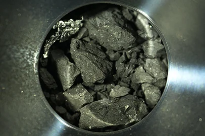 (FILES) This file handout photograph released by the Japan Aerospace Exploration Agency (JAXA) on December 24, 2020 shows samples of soil from the asteroid Ryugu, inside C compartment of the capsule collected by the Hayabusa-2 space probe, at JAXA Sagamihara Campus in Sagamihara, Kanagawa prefecture. - Asteroid dust collected by a Japanese space probe contains organic material that shows some of the building blocks of life on Earth may have been formed in space, scientists said on June 10, 2022. (Photo by Handout / JAXA / AFP) / RESTRICTED TO EDITORIAL USE - MANDATORY CREDIT "AFP PHOTO / JAXA" - NO MARKETING - NO ADVERTISING CAMPAIGNS - DISTRIBUTED AS A SERVICE TO CLIENTS<!-- NICAID(15120372) -->