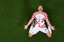 Croatia's forward #09 Andrej Kramaric celebrates scoring his team's first goal during the Qatar 2022 World Cup Group F football match between Croatia and Canada at the Khalifa International Stadium in Doha on November 27, 2022. (Photo by Antonin THUILLIER / AFP)Editoria: SPOLocal: DohaIndexador: ANTONIN THUILLIERSecao: soccerFonte: AFPFotógrafo: STF<!-- NICAID(15277896) -->