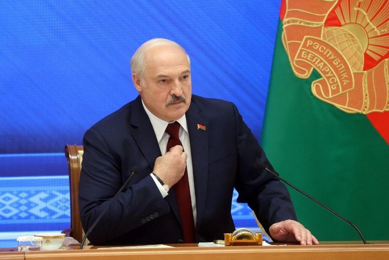Belarus' President Alexander Lukashenko speaks during a press conference in Minsk on August 9, 2021. - Belarus's strongman leader Alexander Lukashenko dismissed international criticism on August 9, 2021, a year after claiming to win a disputed election that led to unprecedented protests in the country. In power since 1994, Lukashenko has been cracking down on opponents since the mass protests that erupted after the vote, deemed unfair by the West.  (Photo by Nikolay PETROV / BELTA / AFP)<!-- NICAID(14857849) -->