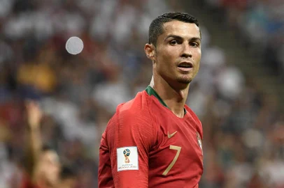 Portugal's forward Cristiano Ronaldo reacts during the Russia 2018 World Cup Group B football match between Iran and Portugal at the Mordovia Arena in Saransk on June 25, 2018. (Photo by Filippo MONTEFORTE / AFP) / RESTRICTED TO EDITORIAL USE - NO MOBILE PUSH ALERTS/DOWNLOADSEditoria: SPOLocal: SaranskIndexador: FILIPPO MONTEFORTESecao: soccerFonte: AFPFotógrafo: STF<!-- NICAID(15275403) -->