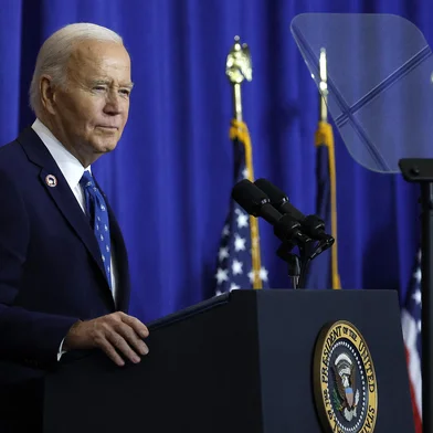 WASHINGTON, DC - DECEMBER 16: U.S. President Joe Biden speaks at the Department of Labor on December 16, 2024 in Washington, DC. Biden signed a proclamation to establish the Frances Perkins National Monument in Maine. Perkins was the first female Cabinet secretary and served as the Labor Secretary under Franklin Roosevelt.   Kevin Dietsch/Getty Images/AFP (Photo by Kevin Dietsch / GETTY IMAGES NORTH AMERICA / Getty Images via AFP)<!-- NICAID(15941378) -->