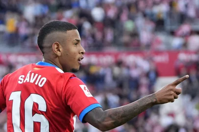 Girona's Brazilian midfielder #16 Savio Moreira celebrates scoring a goal during the Spanish league football match between Girona FC and UD Almeria at the Montilivi stadium in Girona on October 22, 2023. (Photo by Pau BARRENA / AFP)Editoria: SPOLocal: GironaIndexador: PAU BARRENASecao: soccerFonte: AFPFotógrafo: STR<!-- NICAID(15579123) -->