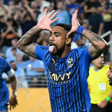Al Hilal's Brazilian forward #77 Malcom celebrates after scoring his team's second goal during the FIFA Club World Cup 2025 round of 16 football match between England's Manchester City and Saudi's Al-Hilal at the Camping World stadium in Orlando on June 30, 2025. (Photo by Chandan Khanna / AFP)<!-- NICAID(16070734) -->