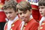 Britain's Prince George of Wales (C) stands at Westminster Abbey in central London on May 6, 2023, ahead of the coronations of Britain's King Charles III and Britain's Camilla, Queen Consort. - The set-piece coronation is the first in Britain in 70 years, and only the second in history to be televised. Charles will be the 40th reigning monarch to be crowned at the central London church since King William I in 1066. Outside the UK, he is also king of 14 other Commonwealth countries, including Australia, Canada and New Zealand. Camilla, his second wife, will be crowned queen alongside him, and be known as Queen Camilla after the ceremony. (Photo by Andy Stenning / POOL / AFP)<!-- NICAID(15421576) -->