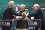 US President Joe Biden (L), Indian Prime Minister Narendra Modi (C) and Brazil's President Luiz Inacio Lula da Silva hold hands during the launch of the Global Biofuels Alliance at the G20 summit in New Delhi on September 9, 2023. (Photo by EVELYN HOCKSTEIN / POOL / AFP)<!-- NICAID(15536274) -->