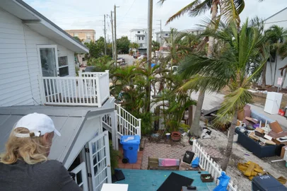 On heels of Helene, storm Milton expected to strengthen into major hurricane and slam FloridaGino looks over the debris that remains in his neighborhood after Hurricane Helene ahead of Hurricane Miltons expected landfall in the middle of this week in Treasure Island, Florida on October 7, 2024. Florida's governor has declared a state of emergency on Saturday as forecasters warned that Hurricane Milton is expected to make landfall later this week. (Photo by Bryan R. SMITH / AFP)Editoria: DISLocal: Treasure IslandIndexador: BRYAN R. SMITHSecao: disaster (general)Fonte: AFPFotógrafo: STR<!-- NICAID(15884990) -->