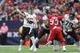 HOUSTON, TEXAS - NOVEMBER 26: Trevor Lawrence #16 of the Jacksonville Jaguars throws a pass during the first quarter against the Houston Texans at NRG Stadium on November 26, 2023 in Houston, Texas.   Carmen Mandato/Getty Images/AFP (Photo by Carmen Mandato / GETTY IMAGES NORTH AMERICA / Getty Images via AFP)<!-- NICAID(15611119) -->