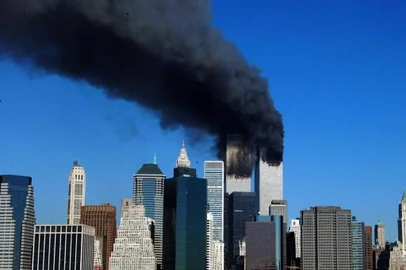 (FILES) In this file photo taken on September 10, 2001, the twin towers of the World Trade Center billow smoke after hijacked airliners crashed into them. - The remains of two more victims of 9/11 have been identified, thanks to advanced DNA technology, New York officials announced on September 8, 2021, just days before the 20th anniversary of the attacks. The office of the city's chief medical examiner said it had formally identified the 1,646th and 1,647th victim of the al-Qaeda attacks on New York's Twin Towers which killed 2,753 people. They are the first identifications of victims from the collapse of the World Trade Center since October 2019. (Photo by HENNY RAY ABRAMS / AFP)<!-- NICAID(14885125) -->