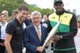 Jamaican sprinter Usain Bolt (R), International Olympic Committee (IOC) President Thomas Bach (L) and President of the Paris 2024 Organising Committee Tony Estanguet (L) pose with the Olympic torch during its presentation on the quays of the river Seine in Paris on July 25, 2023, ahead of the Paris 2024 Olympic and Paralympic Games. The Paris 2024 Summer Olympic Games are held from July 26 to August 11, 2024, and Paralympic Games from August 28 to September 8. (Photo by Alain JOCARD / AFP)Editoria: SPOLocal: ParisIndexador: ALAIN JOCARDSecao: sports eventFonte: AFPFotógrafo: STF<!-- NICAID(15492052) -->