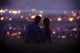 Lovers man and girl against background night city, night starry sky and horizon. Concept date Valentine's Day, first kiss love, forever together.Fonte: 167263266<!-- NICAID(15329218) -->