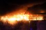 A view shows the burning Crocus City Hall concert hall following the shooting incident in Krasnogorsk, outside Moscow, on March 22, 2024. Gunmen opened fire at a concert hall in a Moscow suburb on March 22, 2024 leaving dead and wounded before a major fire spread through the building, Moscow's mayor and Russian news agencies reported. (Photo by STRINGER / AFP)<!-- NICAID(15714335) -->