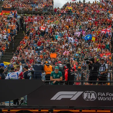Spectators have taken their seats to watch the Formula One Hungarian Grand Prix at the Hungaroring circuit in Mogyorod near Budapest, Hungary, on August 3, 2025. (Photo by Ferenc ISZA / AFP)<!-- NICAID(16099607) -->