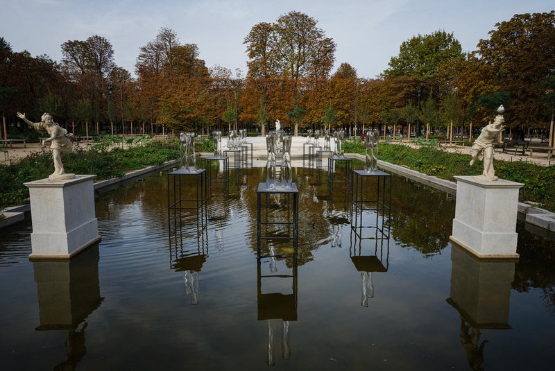 This photograph shows a work by Malagasy artist Joel Andrianomearisoa entitled "Serenade Serenade - Serenade And The Triumph Of Romance" on display at the Tuileries Gardens in Paris on October 16, 2023, as part of Paris+ fair by Art Basel. Works of art in public spaces, exceptional auctions, peripheral exhibitions in all directions: the second edition of the modern and contemporary art fair, Paris+, taken over by Art Basel, opens on October 18, 2023 in Paris, on "emergency attack" alert, the highest level of the "Vigipirate" system. (Photo by Dimitar DILKOFF / AFP) / RESTRICTED TO EDITORIAL USE - MANDATORY MENTION OF THE ARTIST UPON PUBLICATION - TO ILLUSTRATE THE EVENT AS SPECIFIED IN THE CAPTIONEditoria: ACELocal: ParisIndexador: DIMITAR DILKOFFSecao: sculptureFonte: AFPFotógrafo: STF<!-- NICAID(15718527) -->