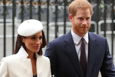 (FILES) In this file photo Britain's Prince Harry (R) and Meghan Markle attend a Commonwealth Day Service at Westminster Abbey in central London, on March 12, 2018. - Britain's Prince Harry, who has blamed press intrusion for contributing to his mother Princess Diana's death in 1997, has told US chat show host Oprah Winfrey he was worried about history repeating itself. Harry and his wife Meghan Markle rocked Britain's monarchy with their shock announcement in January 2020 that they were stepping back from royal duties. CBS on February 28, 2021 released brief clips of an "intimate" interview with Winfrey about their lives which will air March 7. (Photo by Daniel LEAL-OLIVAS / AFP)<!-- NICAID(14736946) -->