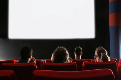 People watching movie in cinema<!-- NICAID(15973929) -->