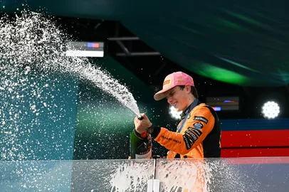McLaren's Australian driver Oscar Piastri celebrates on the podium after winning the 2025 Miami Formula One Grand Prix at Miami International Autodrome in Miami Gardens, Florida, on May 4, 2025. (Photo by Chandan Khanna / AFP)<!-- NICAID(16030211) -->