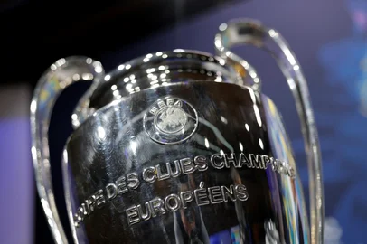 A photo shows European Champion Clubs' Cup trophy displayed on set prior to the draw for the round of 16 of the 2024-2025 UEFA Champions League football tournament at the House of European Football in Nyon, on February 21, 2025. (Photo by Valentin Flauraud / AFP)<!-- NICAID(15981159) -->
