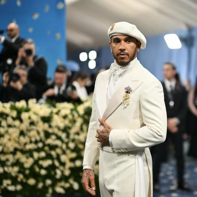 British car driver Lewis Hamilton arrives for the 2025 Met Gala at the Metropolitan Museum of Art on May 5, 2025, in New York. The Gala raises money for the Metropolitan Museum of Art's Costume Institute. The 2025 Met Gala is themed "Tailored for You," aligning with the Costume Institutes exhibition, "Superfine: Tailoring Black Style," set to open to the public on May 10. (Photo by Angela WEISS / AFP)<!-- NICAID(16030885) -->