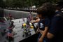 A relative of a victim touches the 9/11 Memorial in New York City, on September 11, 2022, on the 21st anniversary of the attacks on the World Trade Center, Pentagon, and Shanksville, Pennsylvania. (Photo by Yuki IWAMURA / AFP)<!-- NICAID(15202931) -->