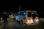 International Red Cross vehicles reportedly carrying hostages released by Hamas cross the Rafah border point in the Gaza Strip on the way to Egypt from which they would be flown to Israel to be reunited with their families, on November 24, 2023. After 48 days of gunfire and bombardment that claimed thousands of lives, a four-day truce in the Israel-Hamas war began on November 24 with 50 hostages set to be released in exchange for 150 Palestinian prisoners. (Photo by Mohammed ABED / AFP)<!-- NICAID(15607927) -->