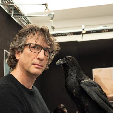 The Sandman. Writer Neil Gaiman on the set of The Sandman. Cr. Ekua King/Netflix © 2022<!-- NICAID(15166985) -->