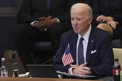 U.S. President Joe Biden looks on as he attends a North Atlantic Council meeting during an extraordinary summit at NATO Headquarters in Brussels on March 24, 2022. (Photo by EVELYN HOCKSTEIN / POOL / AFP)<!-- NICAID(15049618) -->