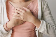 Woman suffering from chest pain heart attack. Healthcare and medical concept.Indexador: JAMEFonte: 289962862<!-- NICAID(15240785) -->
