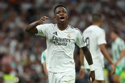 Real Madrid's Brazilian forward #07 Vinicius Junior reacts during the Spanish league football match between Real Real Madrid CF and Real Betis at the Santiago Bernabeu stadium in Madrid on September 1, 2024. (Photo by Thomas COEX / AFP)<!-- NICAID(15858278) -->