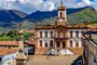 Panoramic view of central square at Ouro Preto city downtownPanoramic view from above the central square of the historic city of Ouro Preto with the museum of the inconfidence and the hills in the backgroundLocal: Ouro PretoIndexador: Fred PinheiroFonte: 200097981<!-- NICAID(15310408) -->
