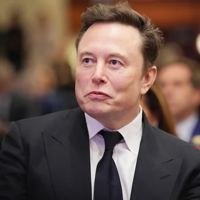 WASHINGTON, DC - NOVEMBER 13: Elon Musk listens as U.S. President-elect Donald Trump addresses a House Republicans Conference meeting at the Hyatt Regency on Capitol Hill on November 13, 2024 in Washington, DC. As is tradition with incoming presidents, Trump is traveling to Washington, DC to meet with U.S. President Joe Biden at the White House as well as meet with Republican congressmen on Capitol Hill.   Andrew Harnik/Getty Images/AFP (Photo by Andrew Harnik / GETTY IMAGES NORTH AMERICA / Getty Images via AFP)<!-- NICAID(15915277) -->