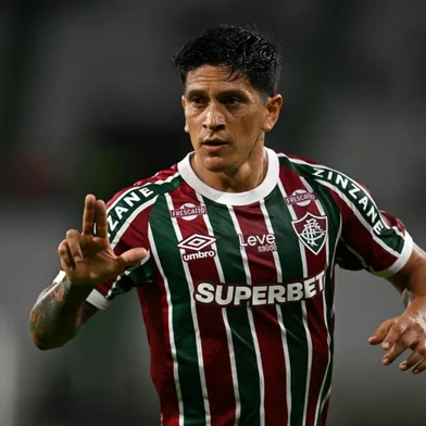 Fluminense's Argentine forward #14 German Cano celebrates after scoring during the Copa Sudamericana group stage football match between Colombia's Once Caldas and Brazil's Fluminense at the Palogrande stadium in Manizales, Colombia, on April 1, 2025. (Photo by RAUL ARBOLEDA / AFP)<!-- NICAID(16010064) -->