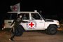 An International Red Cross vehicle reportedly carrying hostages released by Hamas drives towards the Rafah border point with Egypt ahead of their transfer to Israel on November 25, 2023. A group of 13 Israeli and four Thai hostages released by Hamas crossed into Egypt late Saturday, Egyptian state-linked television reported. (Photo by SAID KHATIB / AFP)<!-- NICAID(15608784) -->