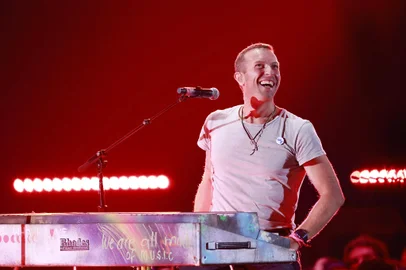 Chris Martin performs on stage during the iHeart Radio Music Festival at the T-Mobile Arena in Las Vegas, Nevada, on September 21, 2024. (Photo by Michael Tran / AFP)<!-- NICAID(15879679) -->